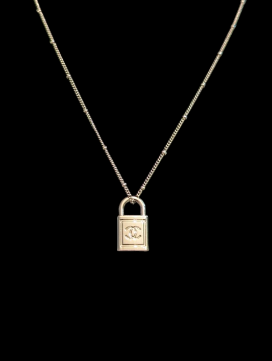 Chanel Silver Lock charm necklace